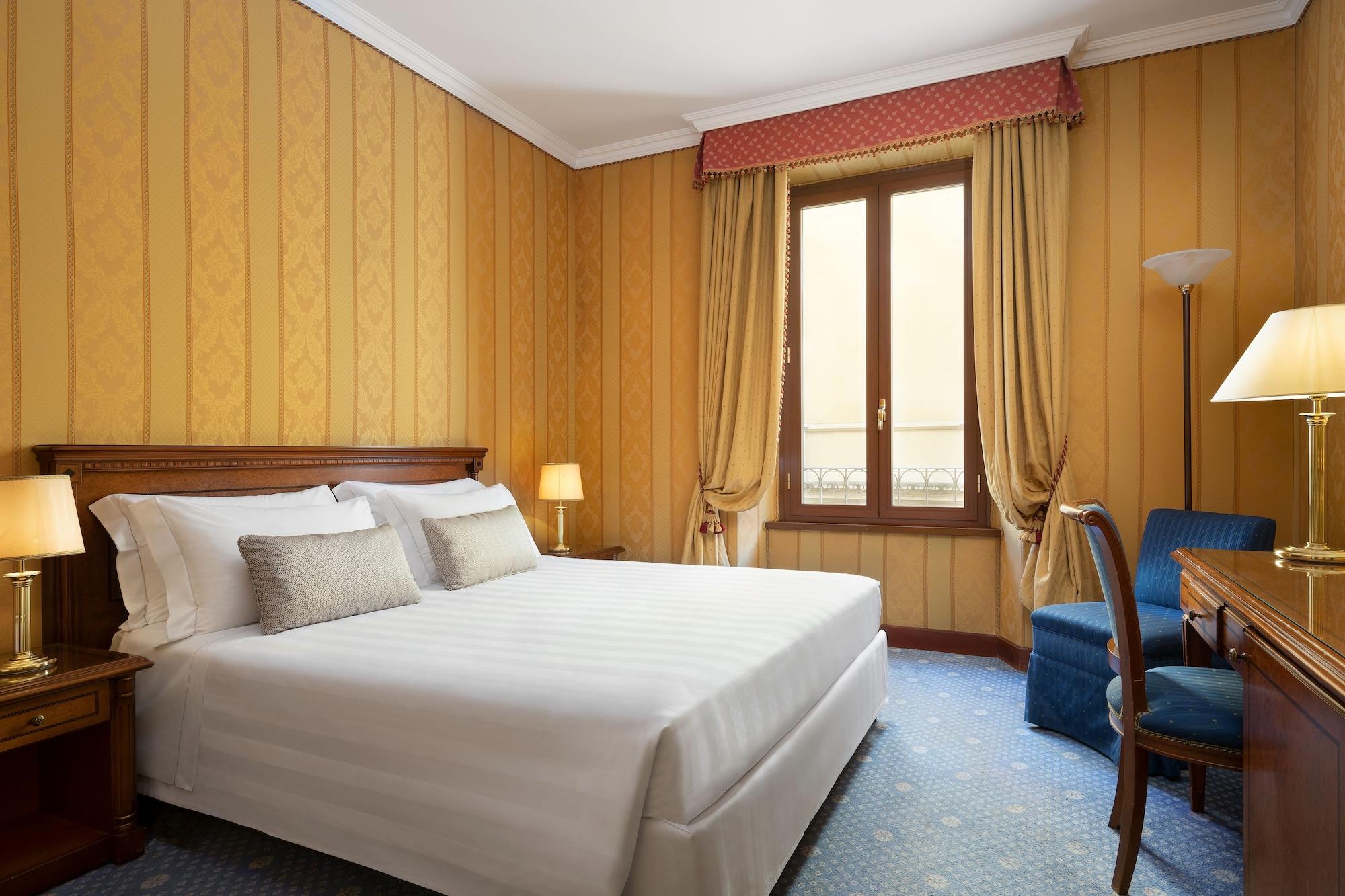 Sina Brufani Hotel Perugia Bagian luar foto A room at the hotel