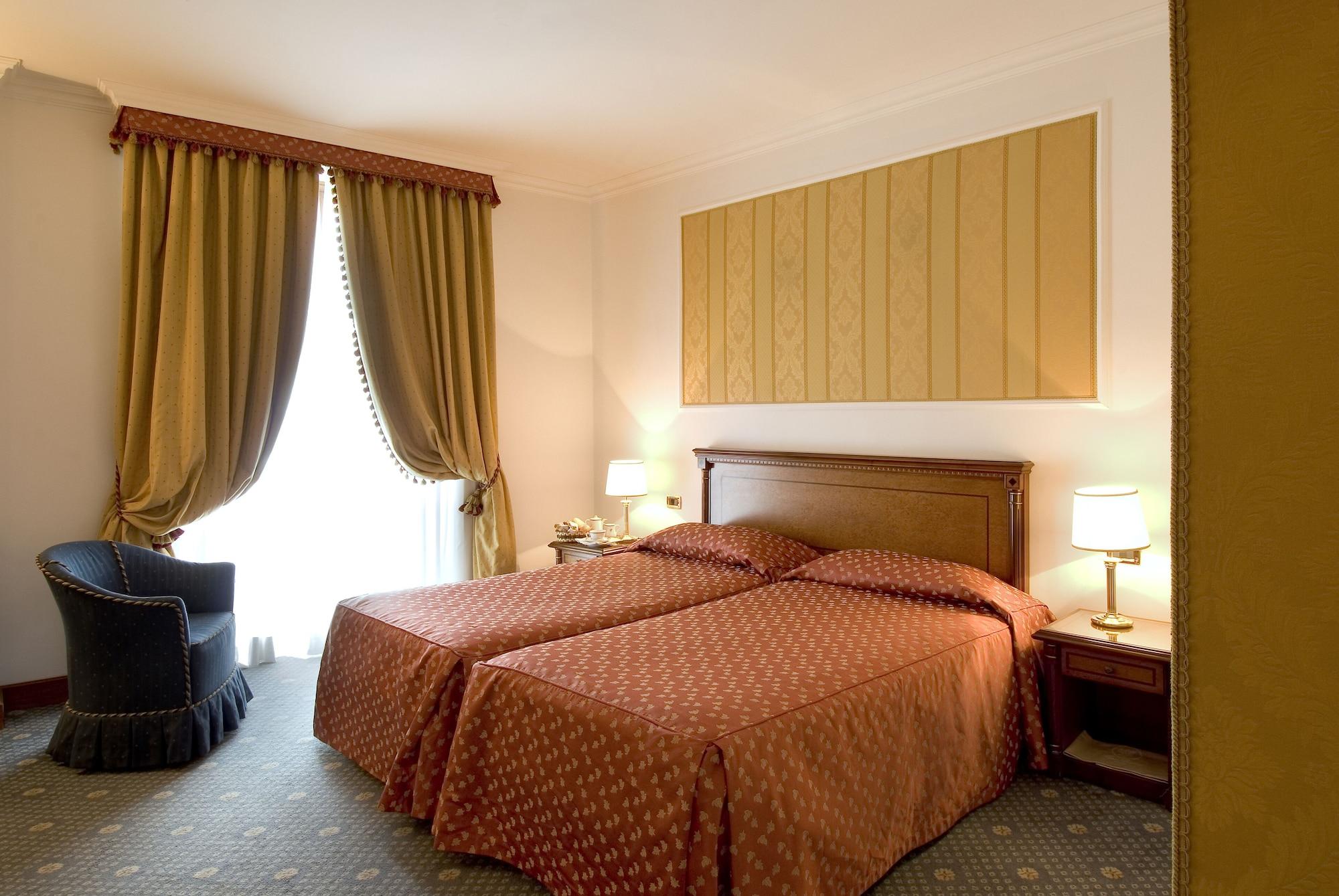 Sina Brufani Hotel Perugia Bagian luar foto A room at the hotel